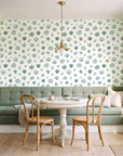 Sketched Seashells Sage seashell wallpaper as a feature wall in a sunlit breakfast nook