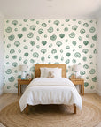 Sketched Seashells Sage seashell wallpaper in a bright, cheerful child's bedroom