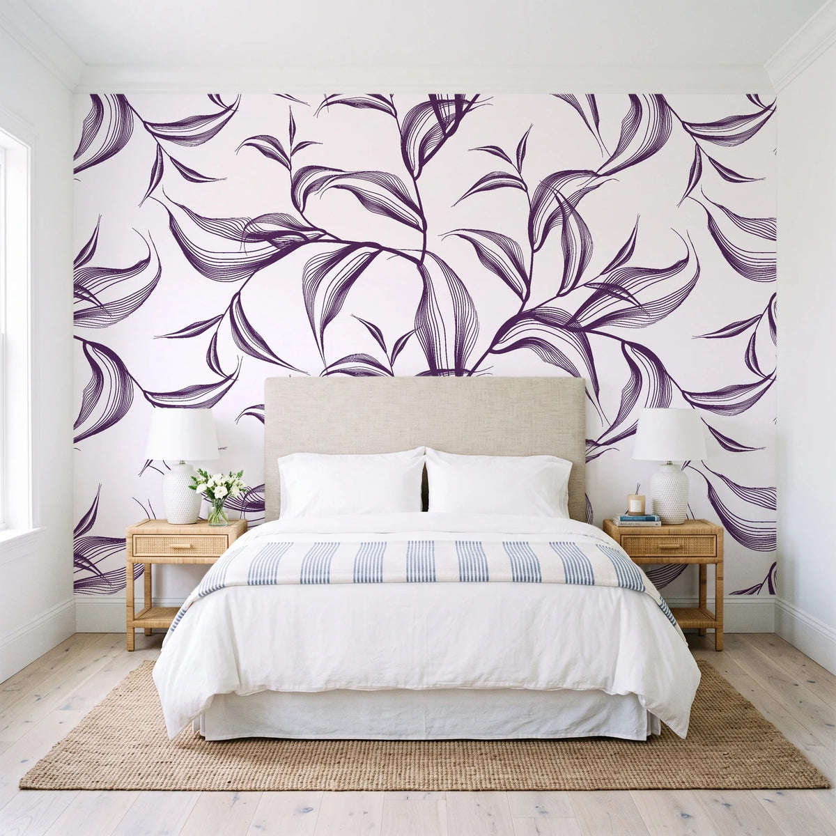 Sketched Silence Plum line art leaf wallpaper behind a queen bed in a bright coastal bedroom