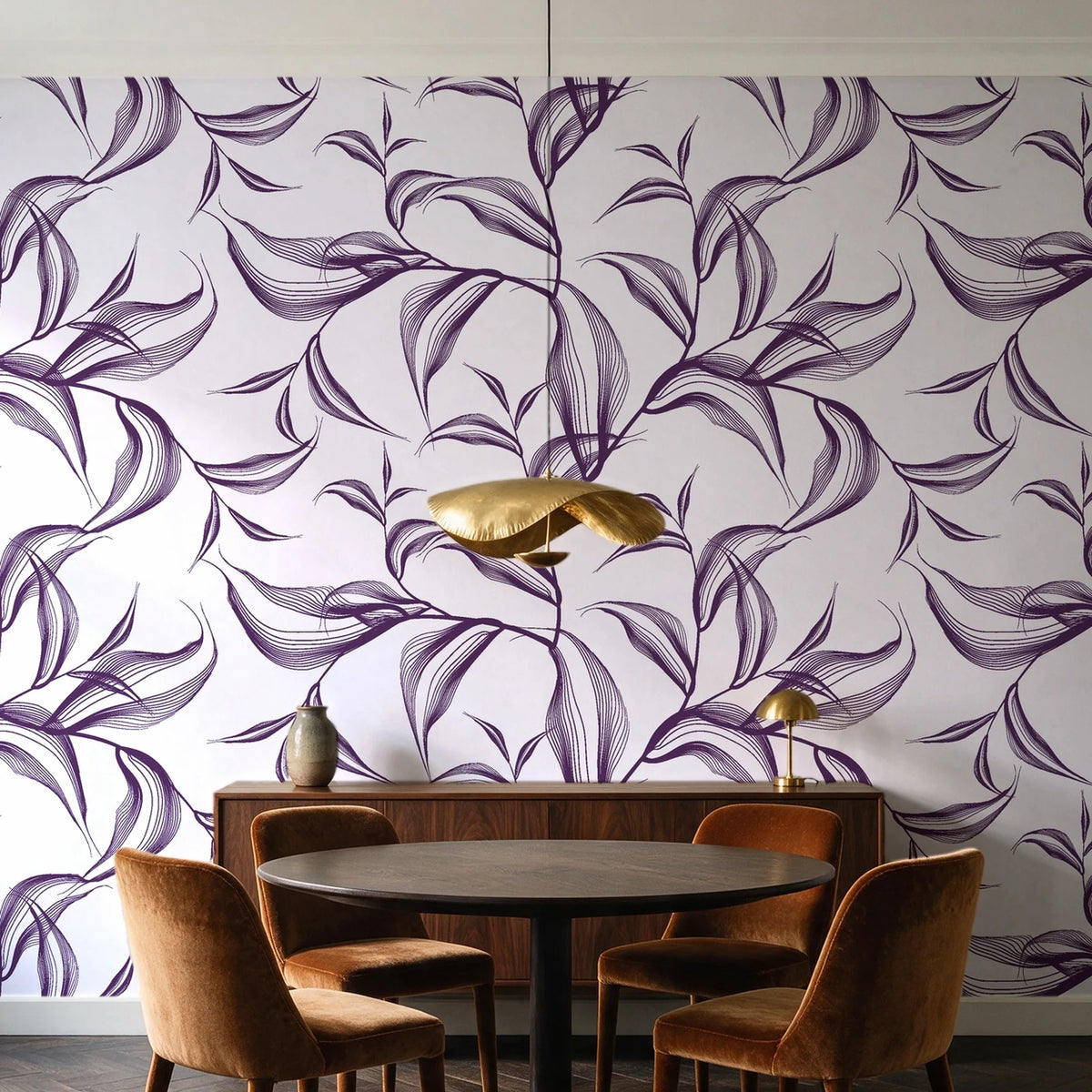 Sketched Silence Plum line art leaf wallpaper behind a walnut credenza and round table in an elegant dining room