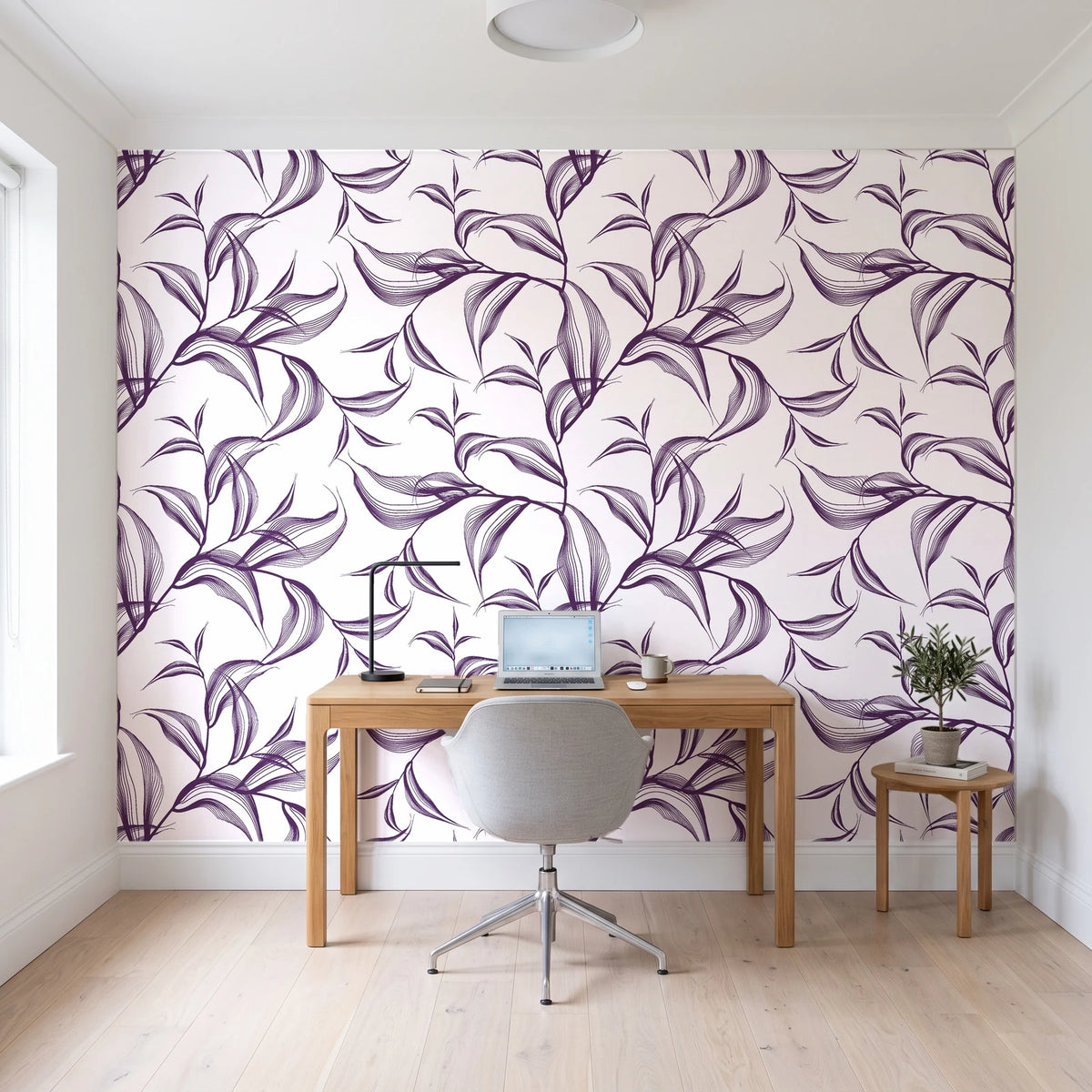 Sketched Silence Plum line art leaf wallpaper behind a modern oak desk in a bright home office