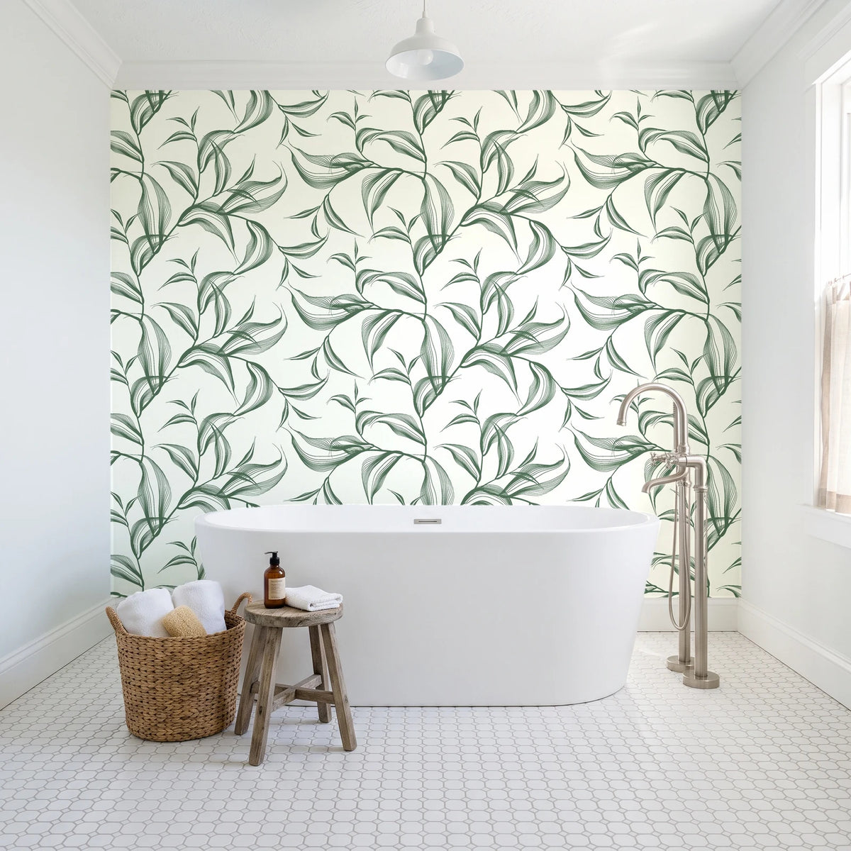 Sketched Silence Sage line art leaf wallpaper behind a freestanding tub in a bright coastal bathroom