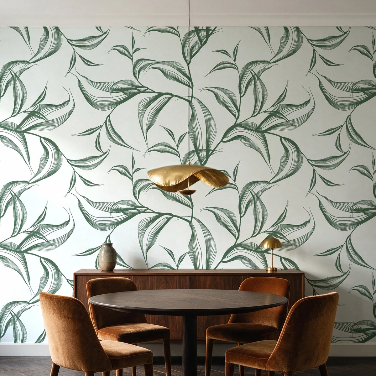 Sketched Silence Sage line art leaf wallpaper behind a walnut credenza and round table in an elegant dining room