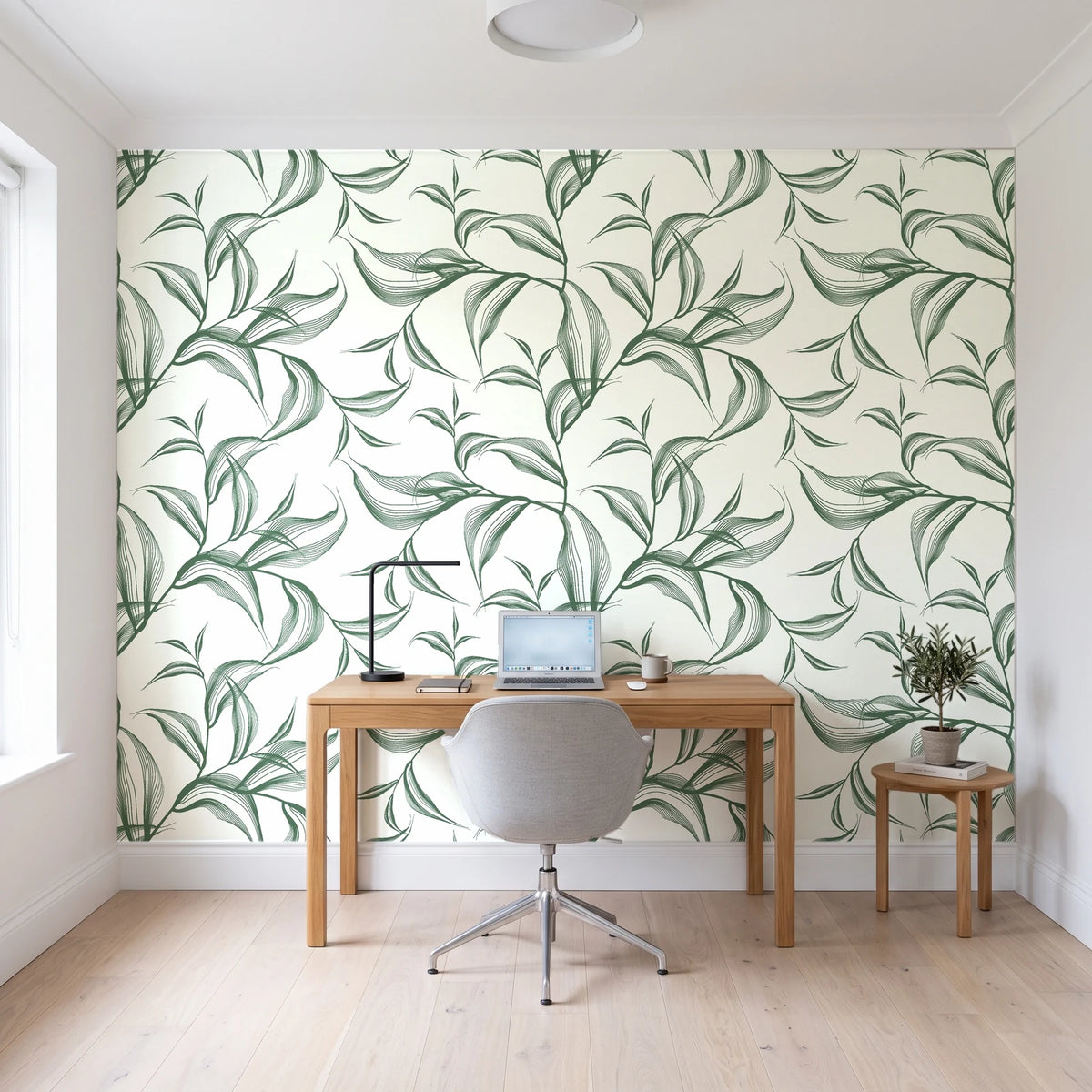 Sketched Silence Sage line art leaf wallpaper behind a modern oak desk in a bright home office