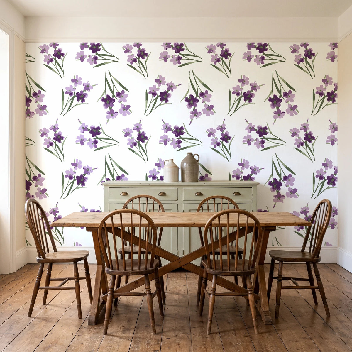 Sky Memory Plum watercolor floral wallpaper in a farmhouse dining room with a sage sideboard and rustic trestle table