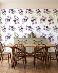 Sky Memory Plum watercolor floral wallpaper in a farmhouse dining room with a sage sideboard and rustic trestle table