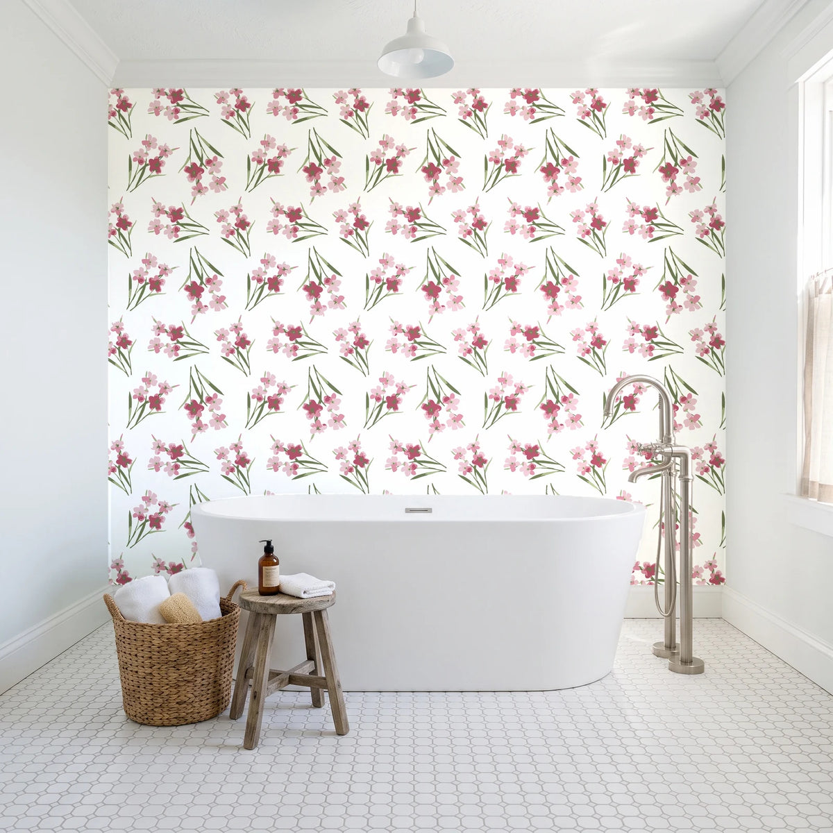 Sky Memory Rosewood watercolor floral wallpaper behind a freestanding tub in a bright coastal bathroom
