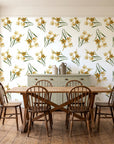Sky Memory Saffron watercolor floral wallpaper in a farmhouse dining room with a sage sideboard and rustic trestle table