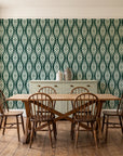 Smoke Ancestry Forest geometric wallpaper in a farmhouse dining room with a sage sideboard and rustic trestle table