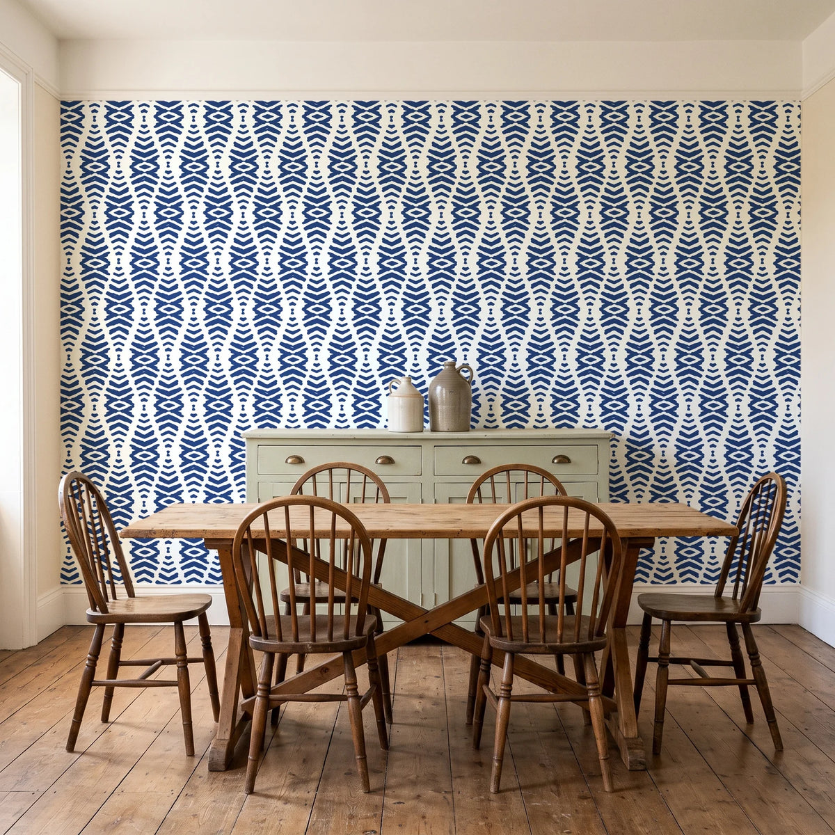 Smoke Ancestry Indigo geometric wallpaper in a farmhouse dining room with a sage sideboard and rustic trestle table