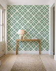 Soft Bouquet Opus Emerald floral damask wallpaper behind a console table in a light entry hallway