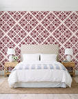Soft Bouquet Opus Oxblood floral damask wallpaper behind a queen bed in a bright coastal bedroom