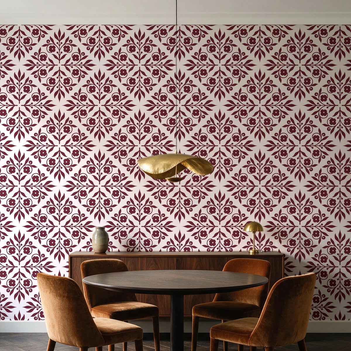 Soft Bouquet Opus Oxblood floral damask wallpaper behind a walnut credenza and round table in an elegant dining room