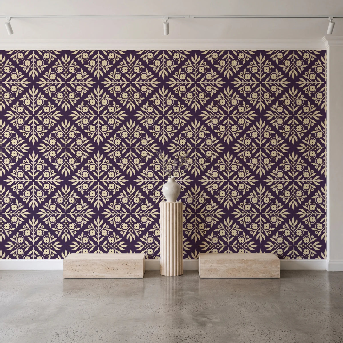 Soft Bouquet Opus Plum floral damask wallpaper behind a travertine pedestal and vase in a minimal boutique