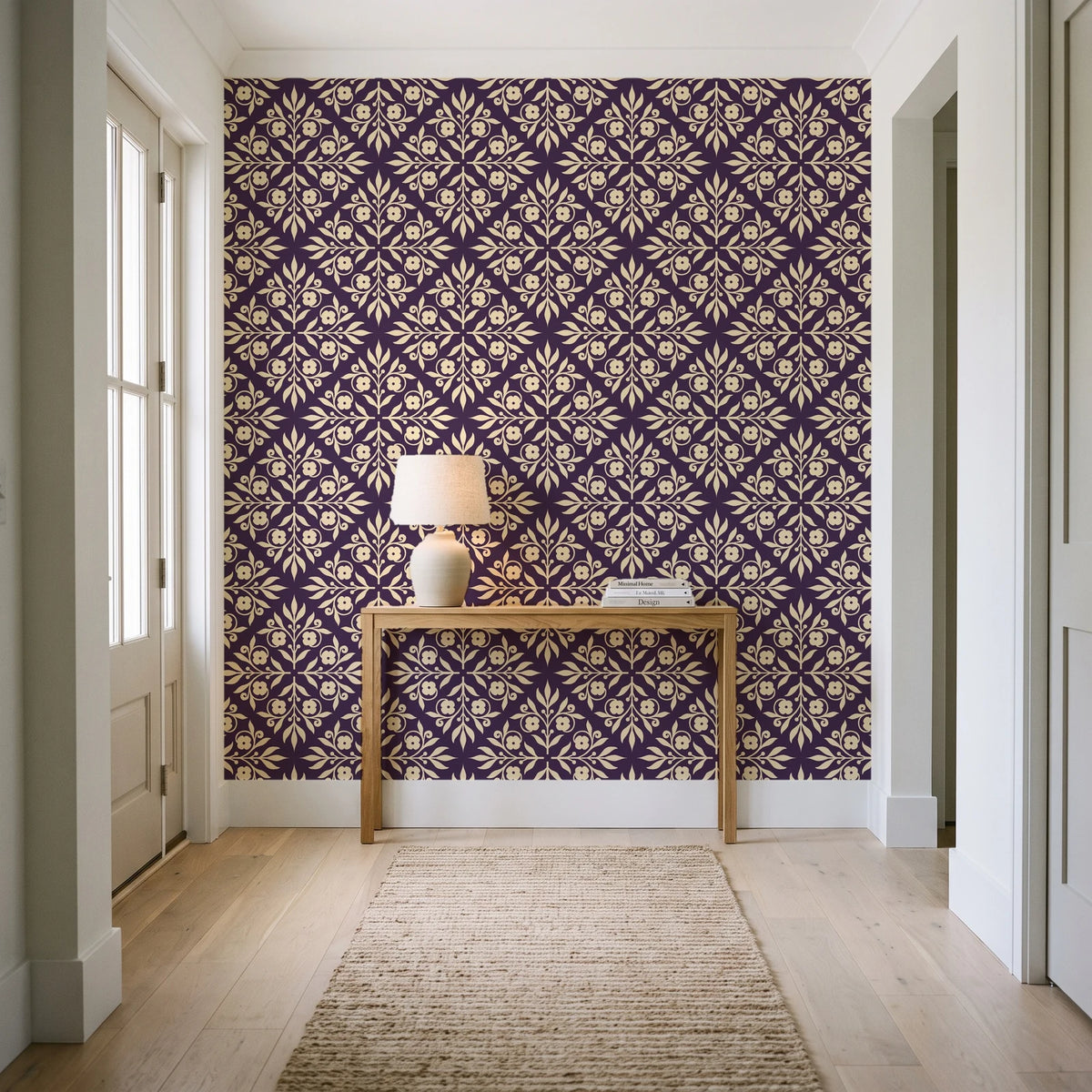 Soft Bouquet Opus Plum floral damask wallpaper behind a console table in a light entry hallway