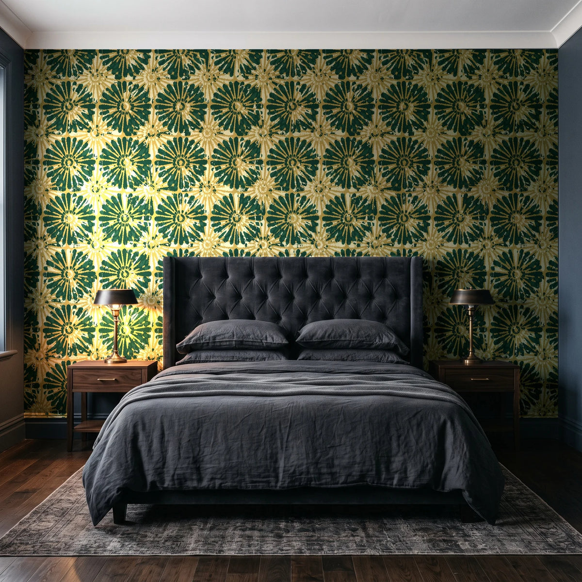 Solar Ritual Emerald floral wallpaper behind a tufted headboard in a dark, moody bedroom