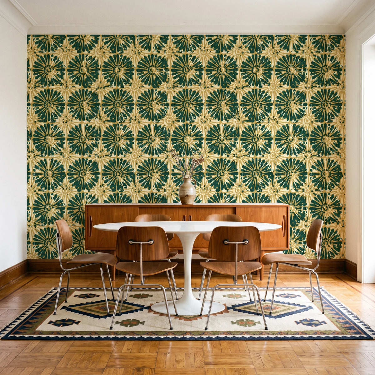 Solar Ritual Emerald floral wallpaper in a mid-century dining room with a teak sideboard and tulip table