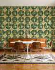 Solar Ritual Emerald floral wallpaper in a mid-century dining room with a teak sideboard and tulip table