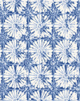 Solar Ritual Indigo floral wallpaper in indigo and ivory