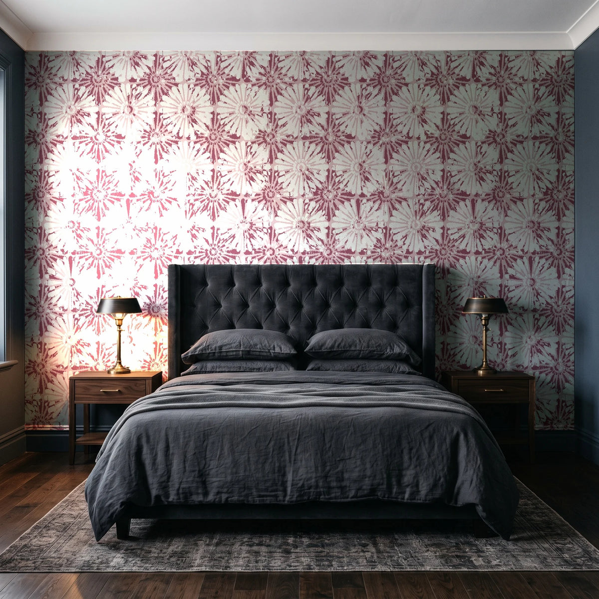 Solar Ritual Rosewood floral wallpaper behind a tufted headboard in a dark, moody bedroom