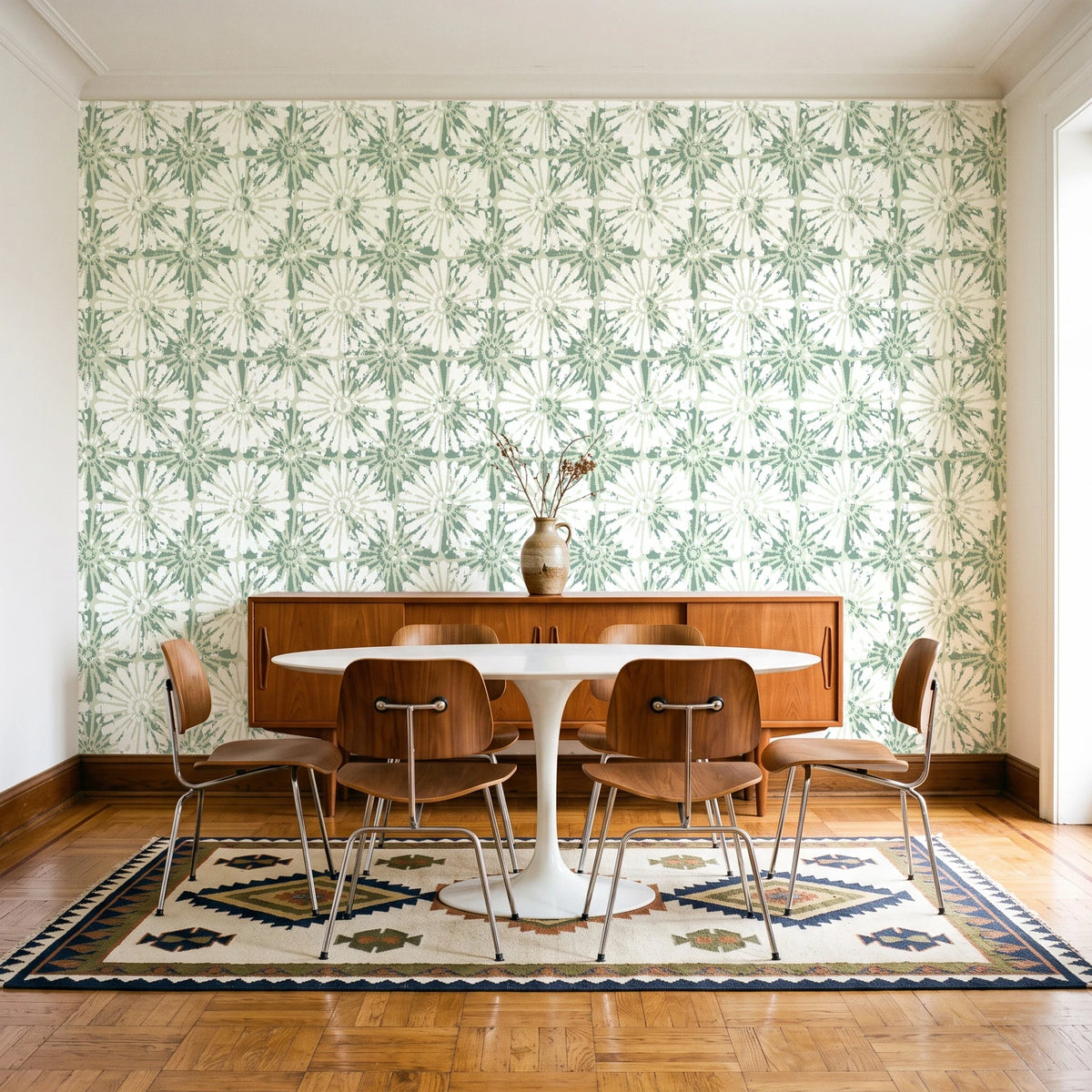 Solar Ritual Sage floral wallpaper in a mid-century dining room with a teak sideboard and tulip table