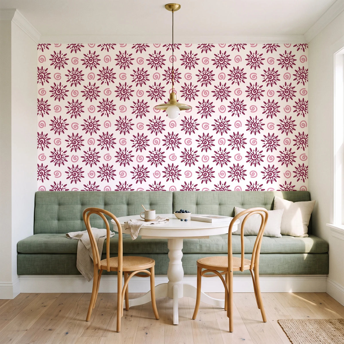 Solstice Bloom Berry folk sun wallpaper as a feature wall in a sunlit breakfast nook