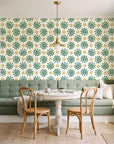 Solstice Bloom Emerald folk sun wallpaper as a feature wall in a sunlit breakfast nook