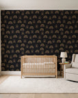 Solstice Rite Eclipse boho rainbow wallpaper in a calm, light-filled nursery