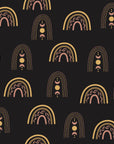 Solstice Rite Eclipse boho rainbow wallpaper in black and gold