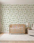 Solstice Rite Forest boho rainbow wallpaper in a calm, light-filled nursery