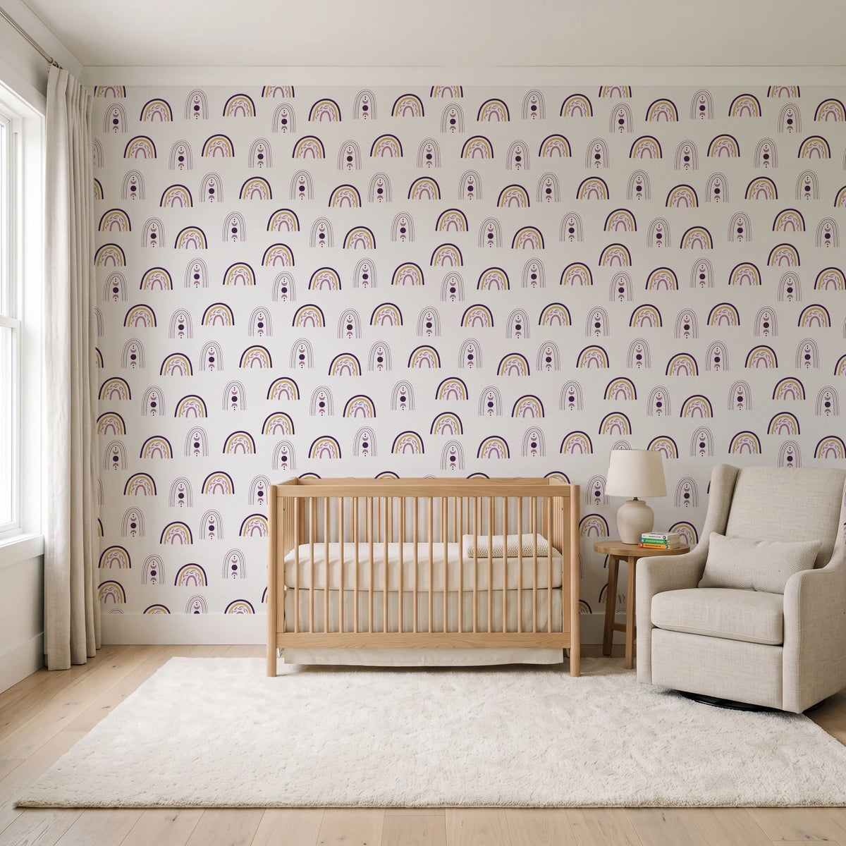 Solstice Rite Plum boho rainbow wallpaper in a calm, light-filled nursery
