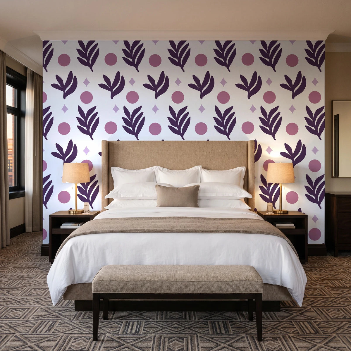 Spice & Frond Plum leaf frond wallpaper behind the headboard of a king bed in a contemporary hotel guest room