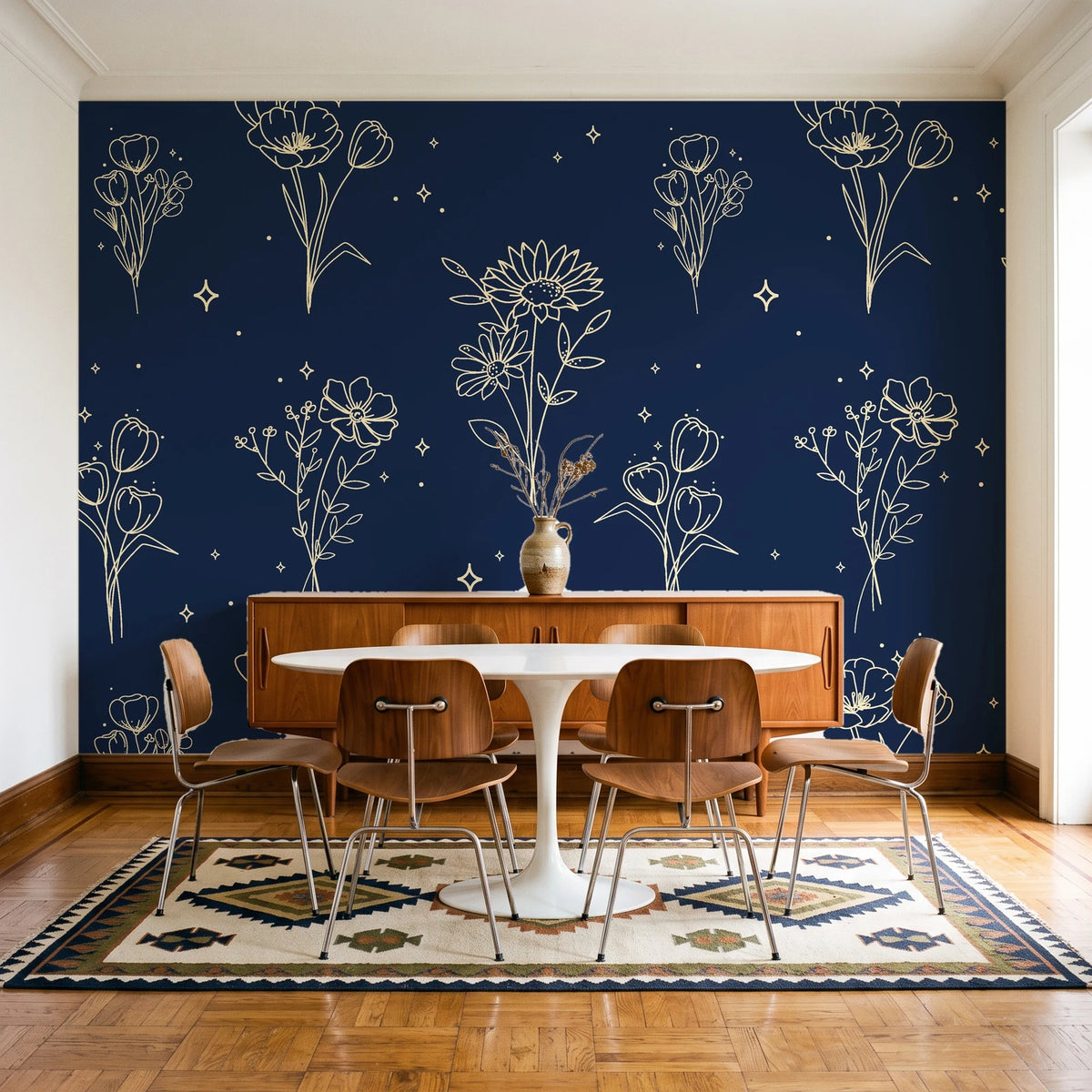 Star & Petal Midnight wildflower line art wallpaper in a mid-century dining room with a teak sideboard and tulip table