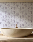 Stardust Field Plum wildflower line art wallpaper creating ambiance in a serene spa bathroom