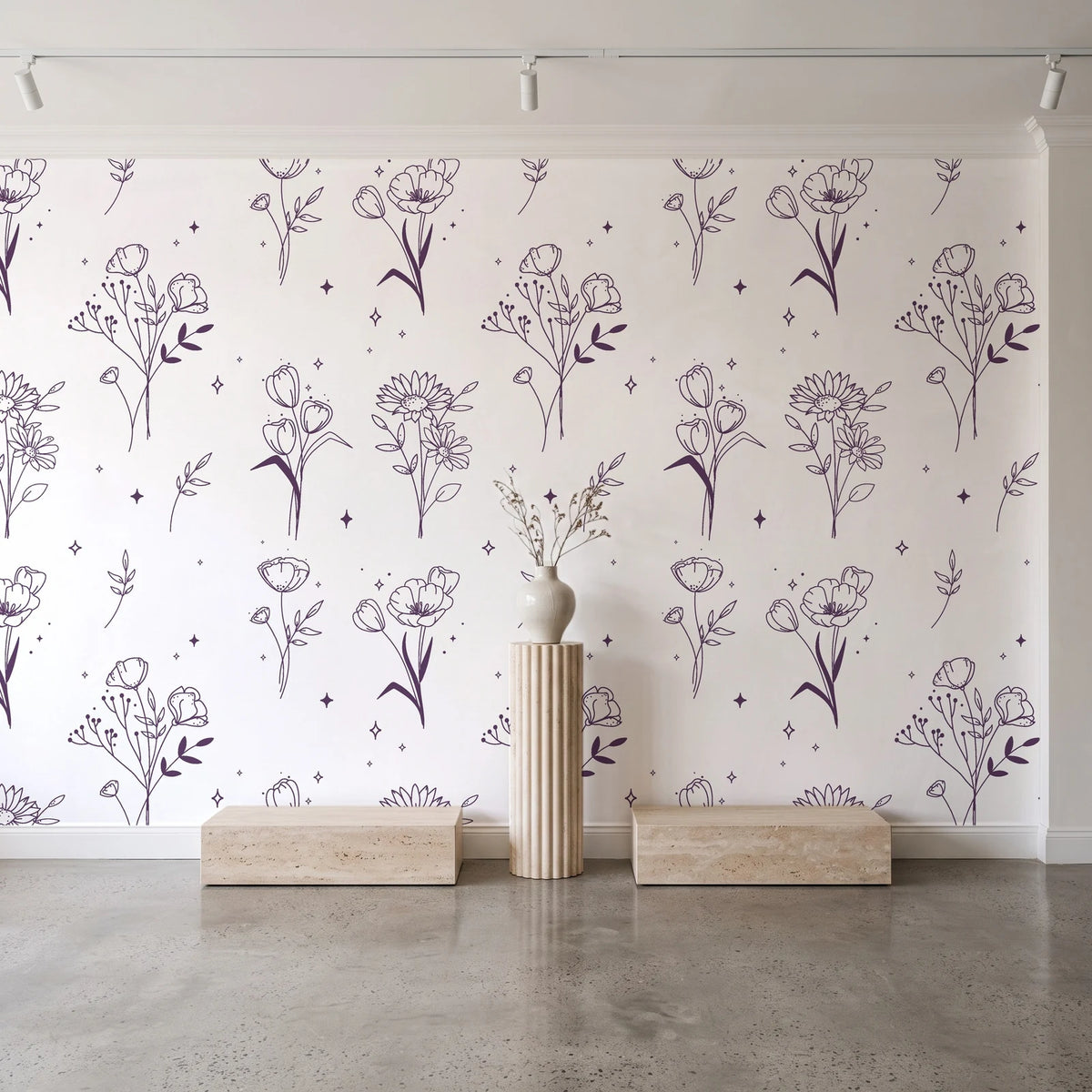 Stardust Field Plum wildflower line art wallpaper behind a travertine pedestal and vase in a minimal boutique