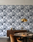 Starfall Charcoal watercolor leaf wallpaper in an elegant dining room