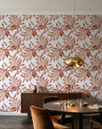 Starfall Terracotta watercolor leaf wallpaper in an elegant dining room