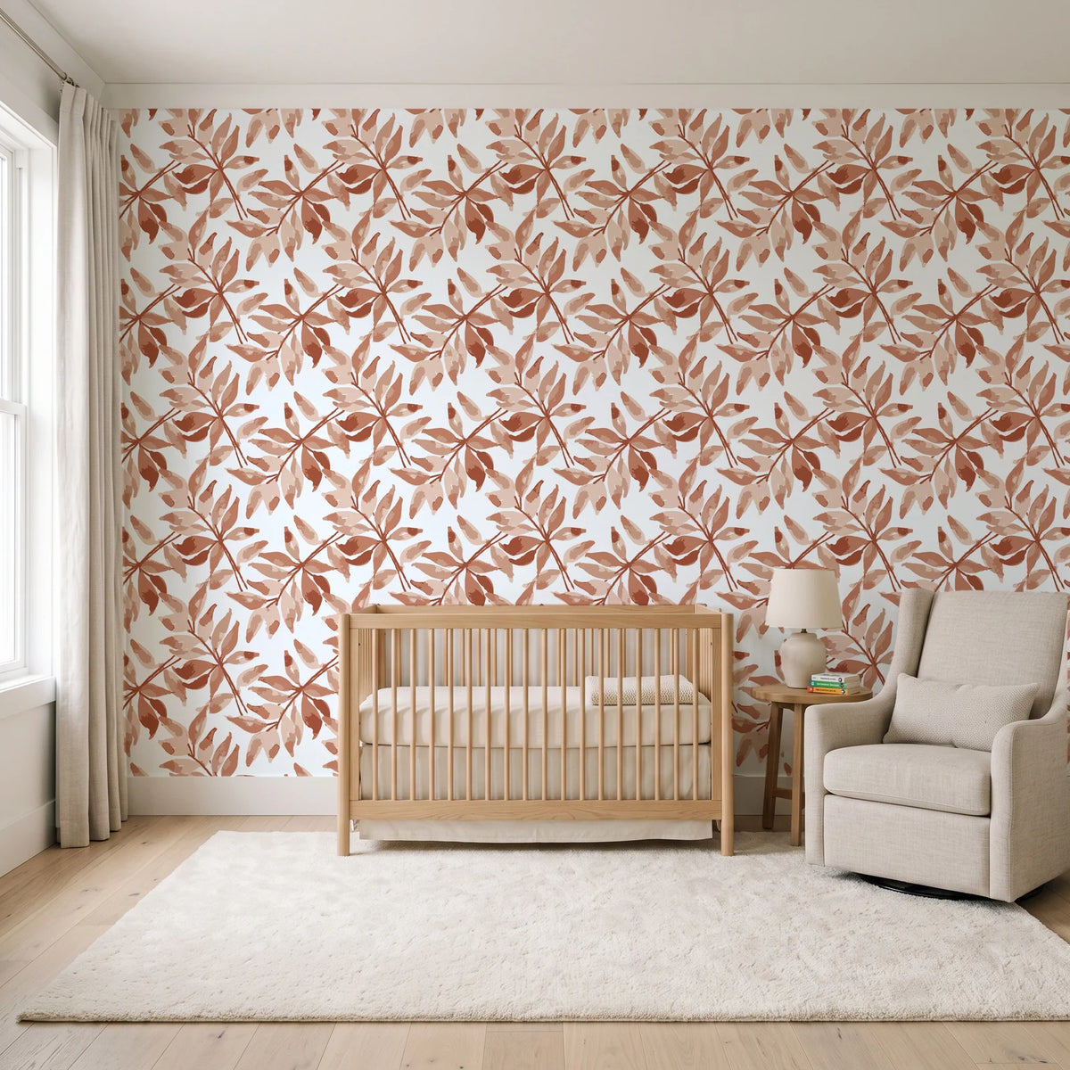 Starfall Terracotta watercolor leaf wallpaper in a calm, light-filled nursery