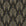 Starlit Swirl Onyx dotted art deco fan wallpaper in black and brass