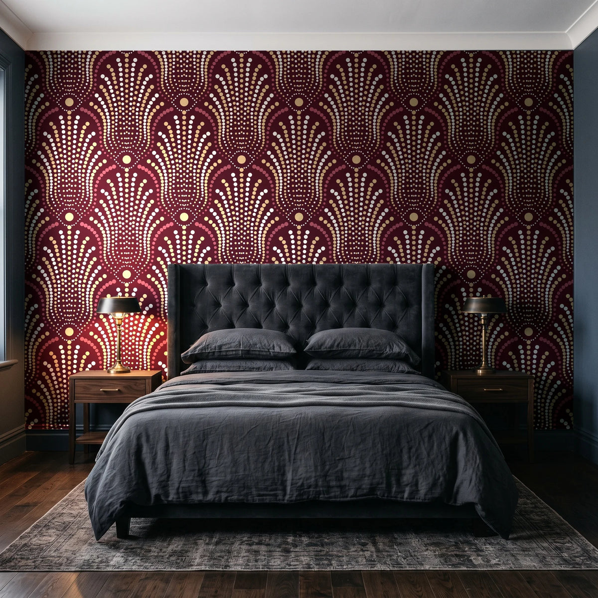 Starlit Swirl Oxblood dotted art deco fan wallpaper behind a tufted headboard in a dark, moody bedroom