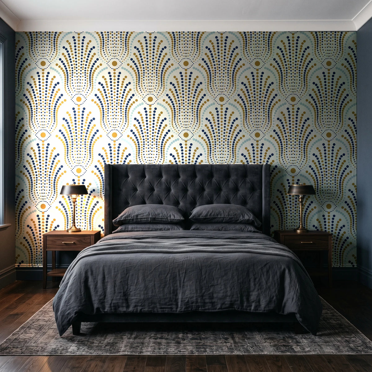 Starlit Swirl Pearl dotted art deco fan wallpaper behind a tufted headboard in a dark, moody bedroom