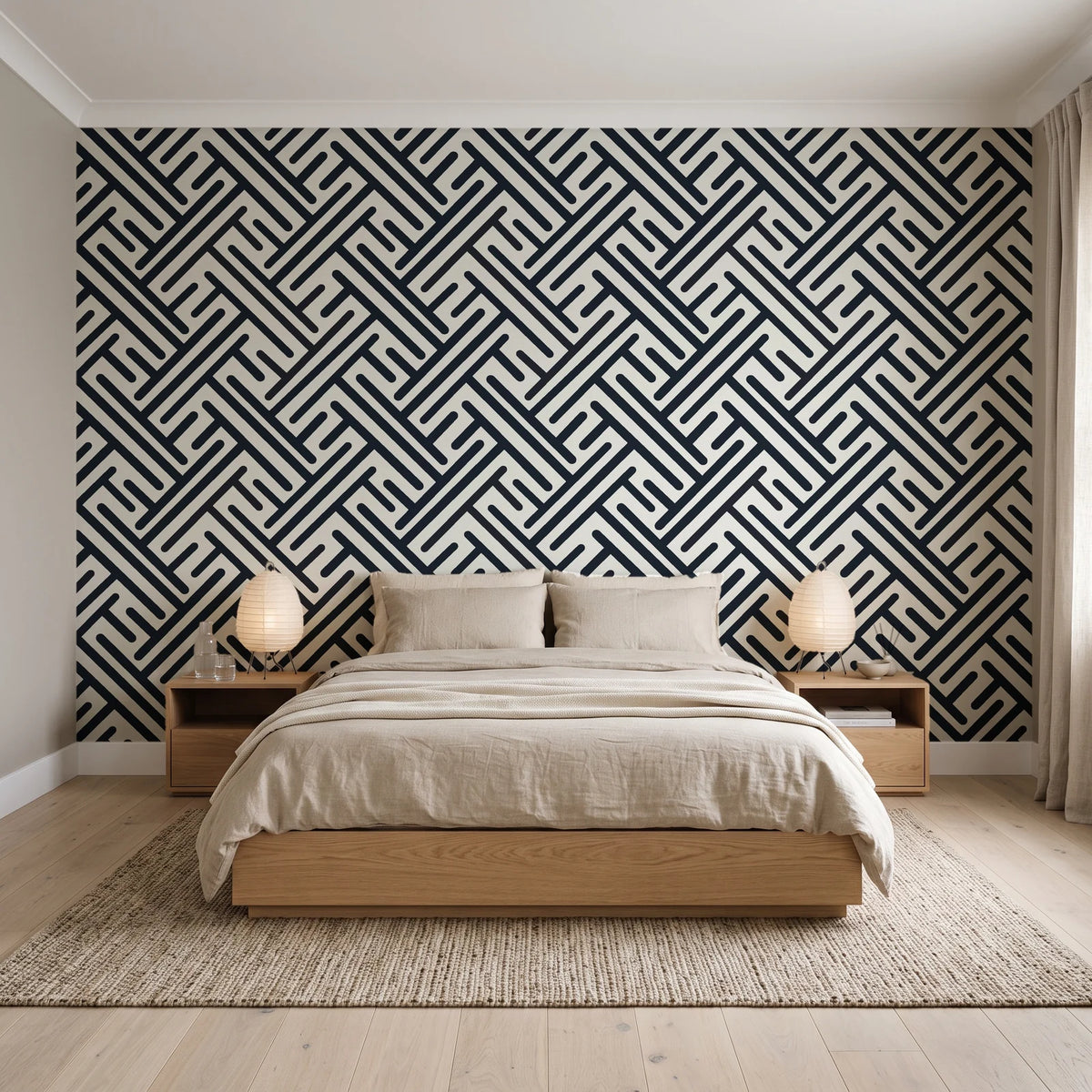 Still Labyrinth Ink maze geometric wallpaper behind a low platform bed in a serene Japandi bedroom