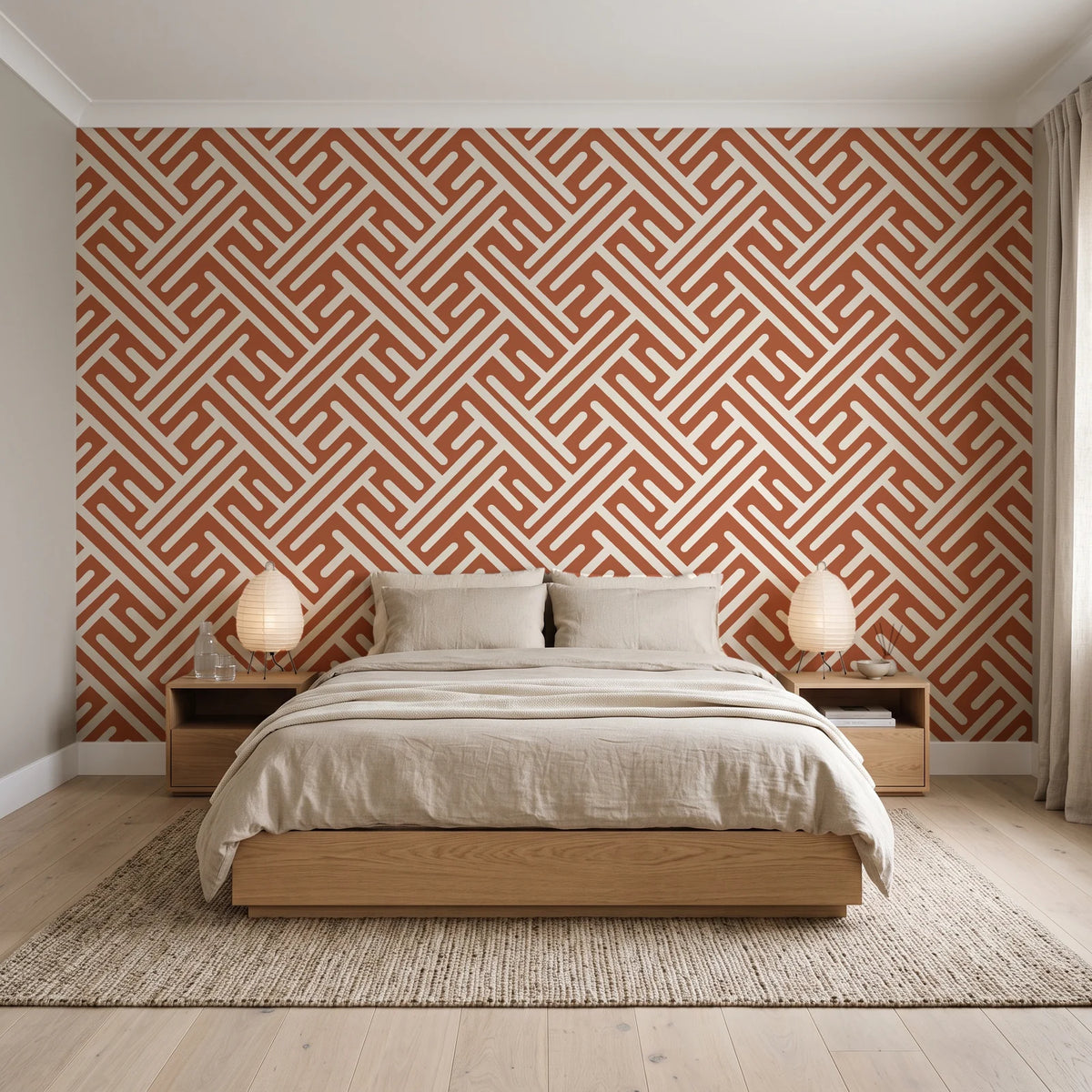 Still Labyrinth Terracotta maze geometric wallpaper behind a low platform bed in a serene Japandi bedroom