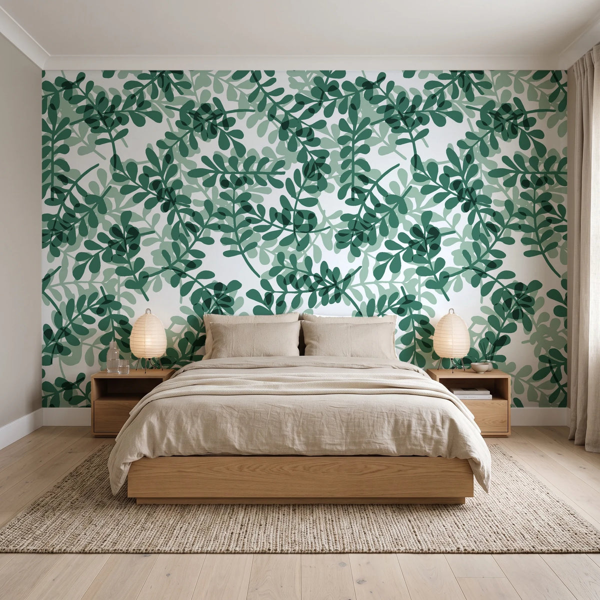 Still Morning Emerald foliage wallpaper behind a low platform bed in a serene Japandi bedroom
