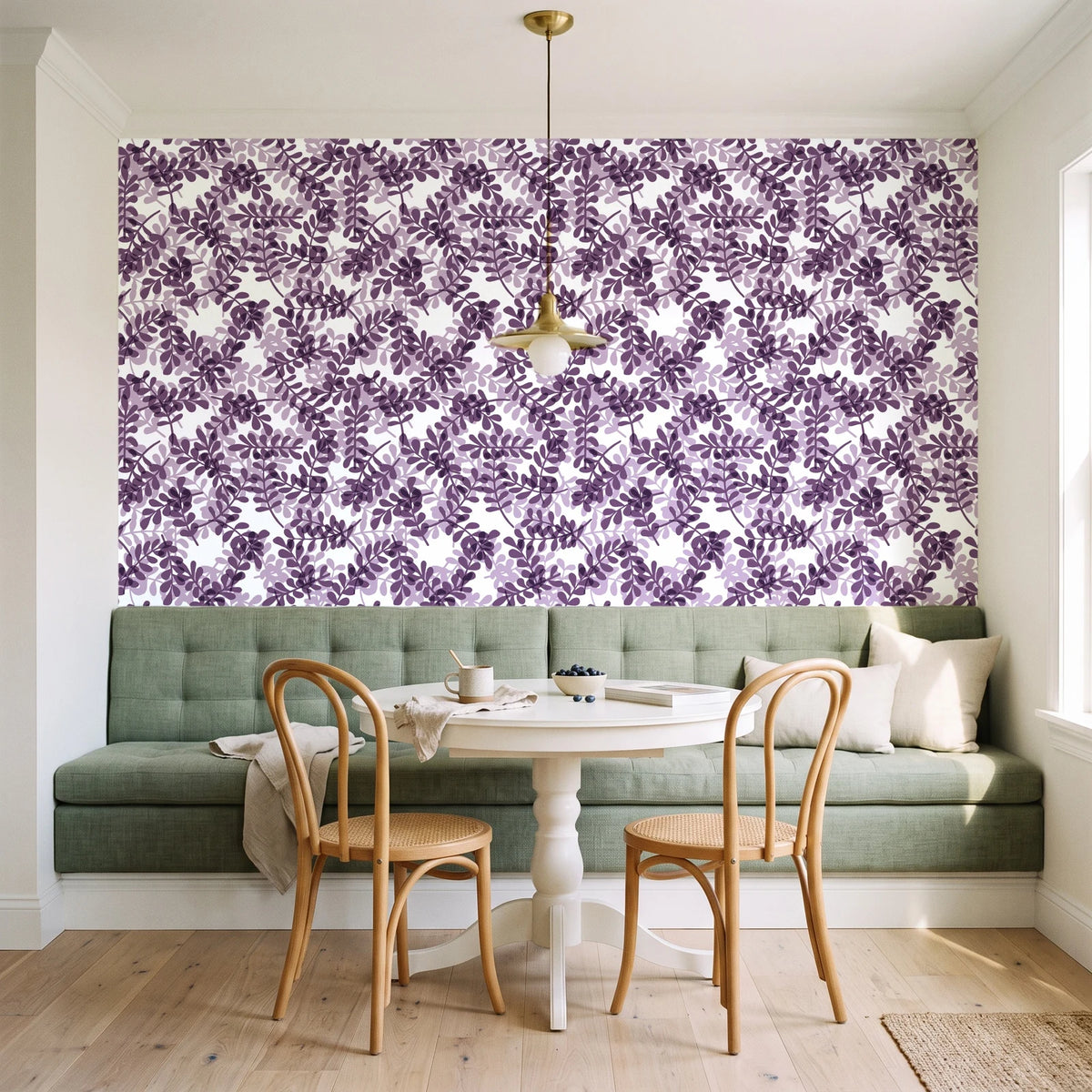 Still Morning Plum foliage wallpaper as a feature wall in a sunlit breakfast nook