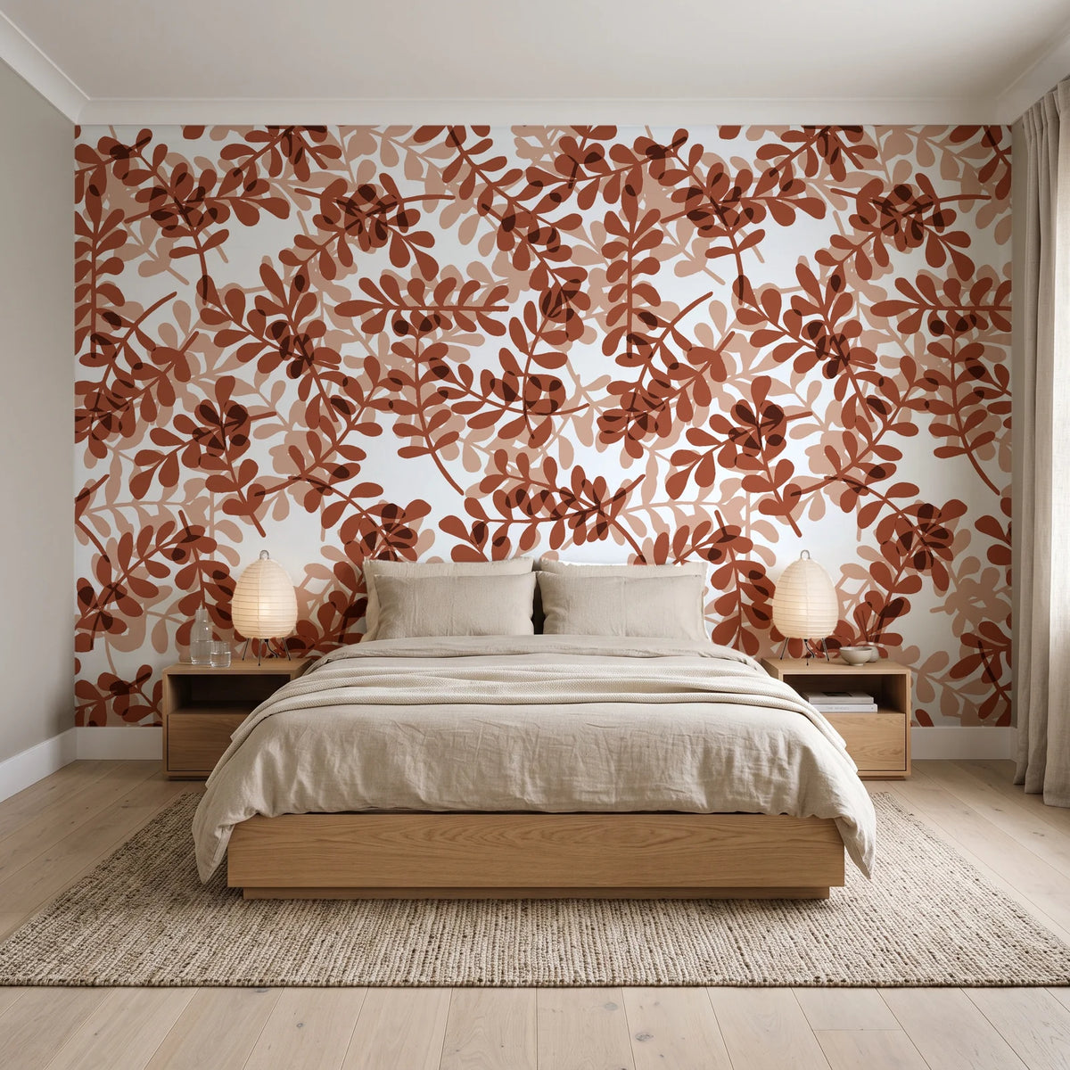 Still Morning Terracotta foliage wallpaper behind a low platform bed in a serene Japandi bedroom