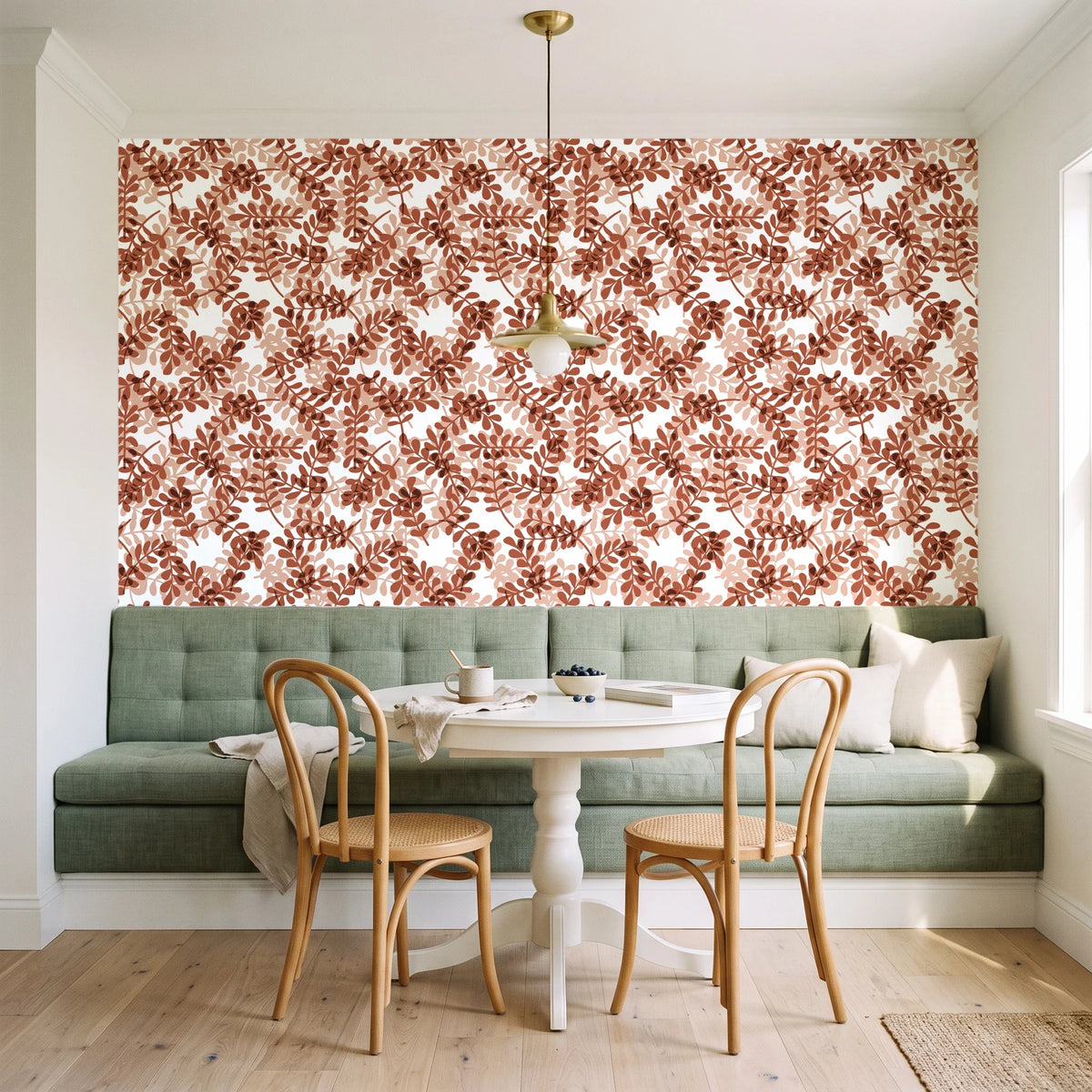 Still Morning Terracotta foliage wallpaper as a feature wall in a sunlit breakfast nook