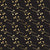 Stone Garden Noir sprig wallpaper in black and gold