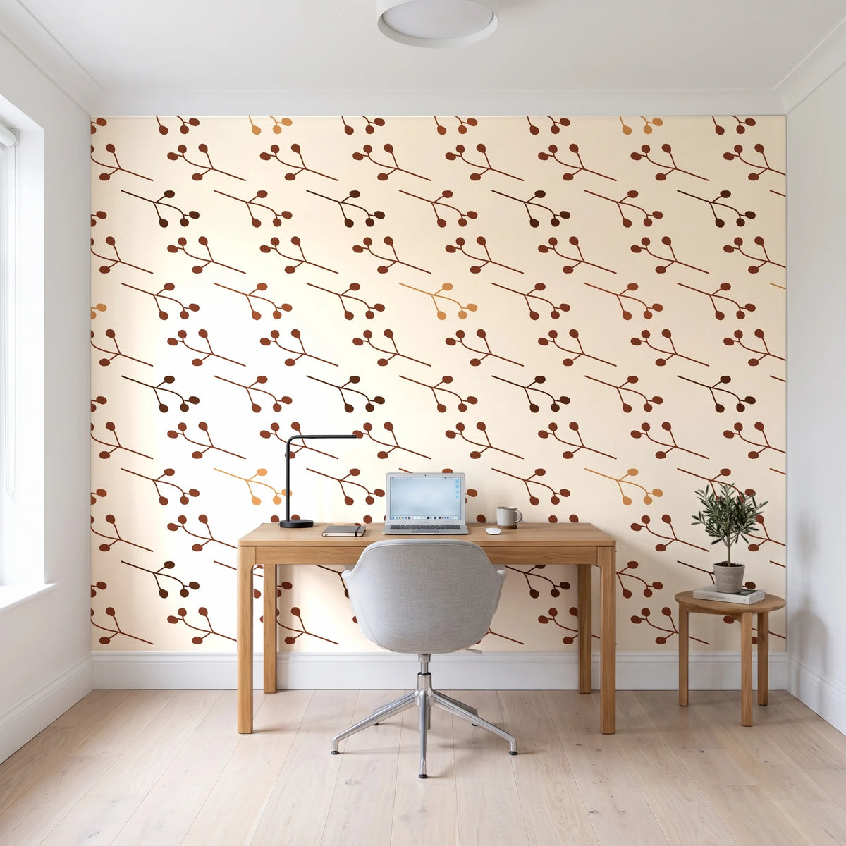 Stone Garden Terracotta sprig wallpaper behind a modern oak desk in a bright home office