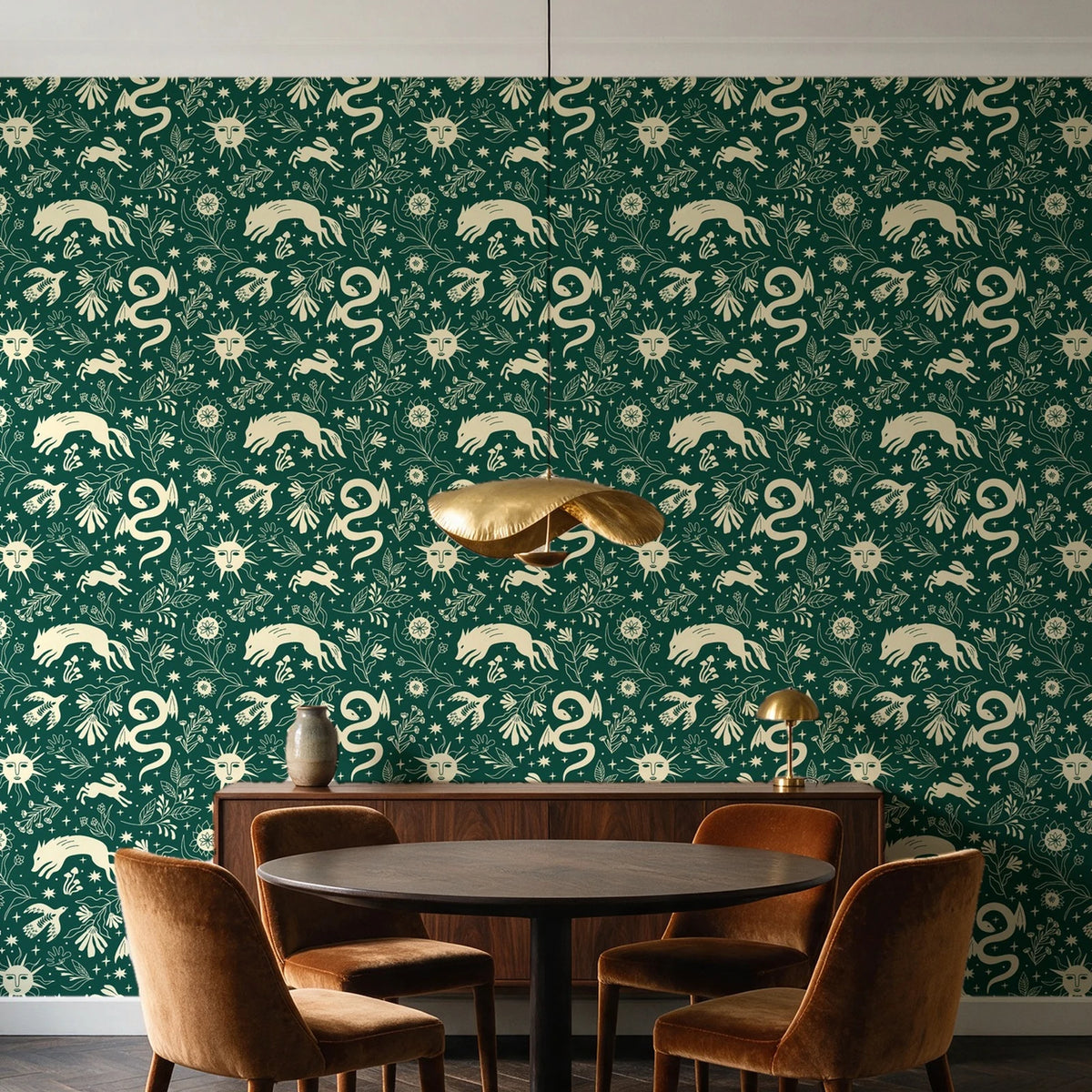 Sun & Moon Emerald celestial folk wallpaper behind a walnut credenza and round table in an elegant dining room